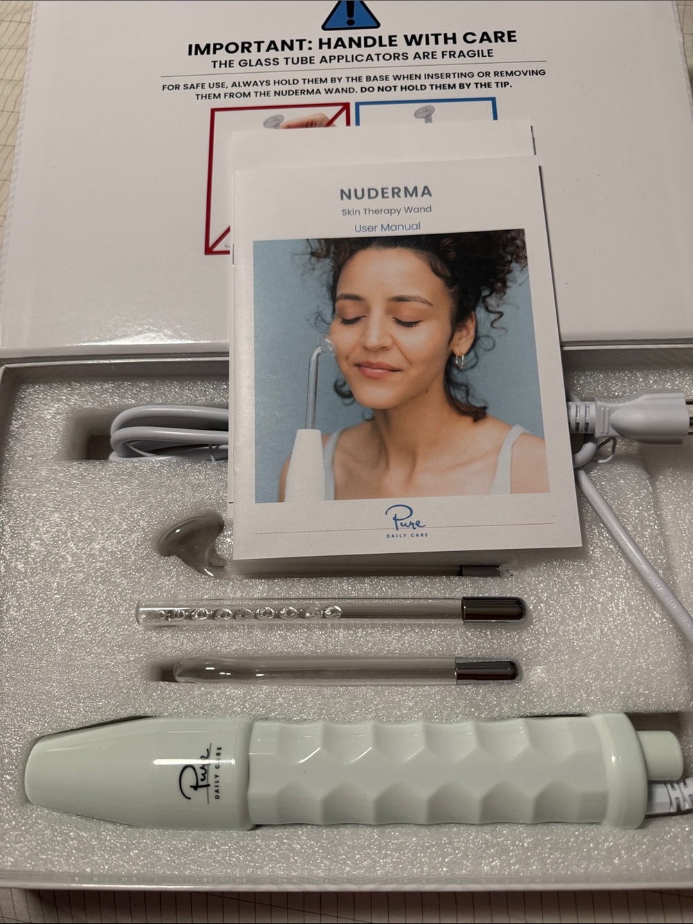 NUDE Skin Therapy Facial Wand in Mint with Silver Tips